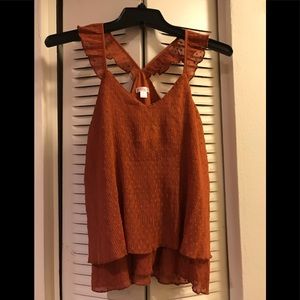 Pleated burnt orange sleeveless top
